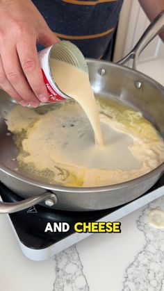 a person pouring cheese into a pan on top of a stove with the words and cheese below it