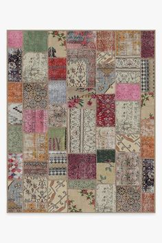 an old patchwork rug with many different colors and patterns