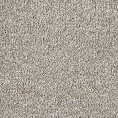 a close up view of a carpet textured with gray and white colors, it is very soft