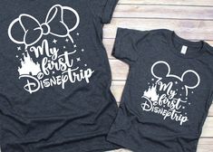 two matching shirts that say my first disneyland and my first disney