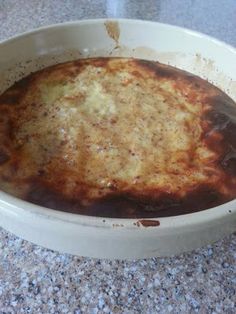 an uncooked casserole is sitting on the counter