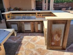 Outdoor patio bar with Dakota Tin wainscoting. Would also make a great bar idea for basements and mancaves. Tin Wainscoting, Barn Bar, Installing Wainscoting, Barn Tin, Corrugated Tin, Metal Wall Panel, Steel Barns, Outdoor Patio Bar, Tin Walls