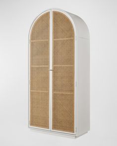 a tall white cabinet with wicker doors on the front and side, against a white background