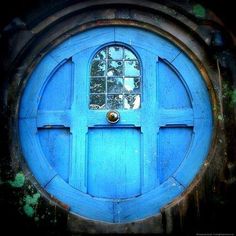 an image of a blue door that is in the shape of a circle