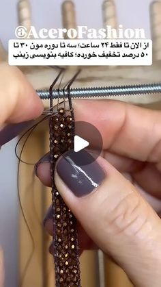 a person is working on some kind of beading