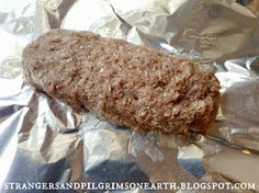 a piece of food sitting on top of aluminum foil