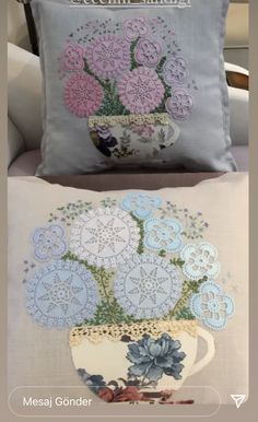 two pillows that have flowers in them on top of each other, and one has a mug