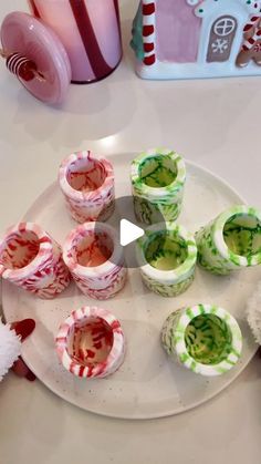 some candy cups are sitting on a plate