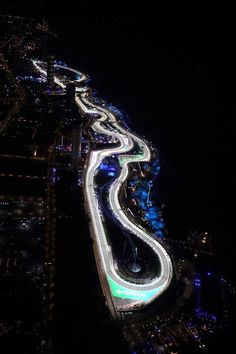 an aerial view of a highway at night