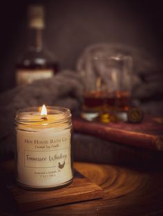 a candle sitting on top of a wooden table