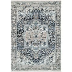 a blue and beige rug with an intricate design