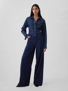 Fit: A full-length, supersoft baggy jean that's fitted on the waist & relaxed all the way down.  ​ Fabric: 55% Cotton, 40% Tencel, 5% Recycled Cotton.  Stretch:  No Stretch Jeans.  Authentic denim that gets better with every wear.  Made to wear all day & break in over time.  ​ Rise :   Mid Rise Jeans.  Look: A five-pocket baggy jean in a dark indigo wash.  ​ Details:  Zip fly & five-pocket styling.  Responsibly Made:  This pair of denim is made with 5% recycled cotton and is part of our water-sa Dark Wash Jeans Outfit, 2024 Wardrobe, Brown Denim, Comfortable Chic, Baggy Jean, London Style, Water Saving, Brown Pants, Dark Indigo