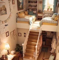 two bunk beds sitting next to each other on top of a wooden floor in a room