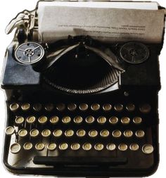 an old fashioned typewriter with paper and keys