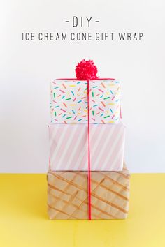 three wrapped presents sitting on top of each other with the text diy ice cream cone gift wrap