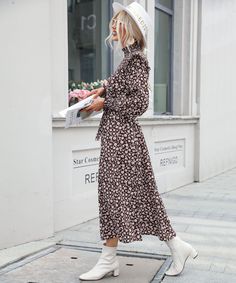 Our Fall Has Sprung dress comes in a coffee brown base with pink daisy prints. The relaxed fit midi-maxi features a soft v neckline, the gaga shoulder making this the perfect balmy evening dress. This dress pairs beautifully with our all season ankle boots and chunky gold accessories. Size Guide: Susu is 5’6” tall, and has a 33.5” bust, 24.8”waist, & 37.4” hips. She is wearing a S / US 4 / AU 8. This maxi dress is true to size. Material: 100% Polyester Feature: Maxi Length. High neckline. Flowy Spring Maxi Dress, Picture Style, Women Long Sleeve Dress, Elegant Dresses For Women, Pink Daisy, High Neck Long Sleeve, Selling Clothes, Long Sleeve Turtleneck, Coffee Brown