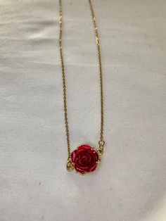 This gold chain features a red rose pendant. Rose Rouge, Rose Pendant, Rose Necklace, Red Rose, Pendant Necklaces, Gold Chain, Gold Chains, Austria, Favorite Jewelry