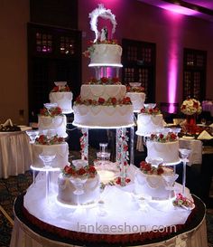 a large white cake sitting on top of a table