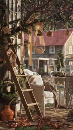 an outdoor christmas tree with ornaments hanging from it's branches and decorations on the outside