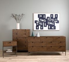 a living room scene with focus on the dresser and sideboard in the foreground