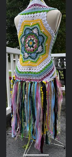 Attend your next music festival and this adorable Fae vest with mixed materials tail flare. Crochet Fairy Outfit, Multicolor Hippie Festival Vest, Whimsical Handmade Crochet Festival Hat, Rainbowcore Fashion, Crochet Fae Vest, Freeform Crochet Earthfaire, Hippie Crafts, Boho Crafts Diy, Festival Gear