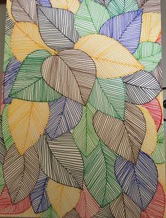 a drawing of colorful leaves on a piece of paper that is drawn with colored pencils