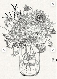 a mason jar filled with lots of flowers