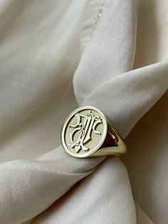 "custom gold monogram signet ring delicately engraved and personalized with your initials or any other image you want ♡ the ring has solid back. deep and detailed engraving very delicately handcrafted unisex - looks super cool on both women & men side or inside engravings cost 12 USD for both sides. please contact us if you request side engravins or simply go back to our shop and purchase the \"Side or inside engraving fee\" listing. available in 4 oval face sizes: small - 11x13 mm medium - 13x1 Signet Ring Design Ideas, Signet Ring Men Initials, Vintage Signet Ring Men, Modern Signet Ring, Symbolic Engraved Signet Ring As Promise Ring, Symbolic Engraved Signet Ring For Promise, Symbolic Engraved Signet Ring For Wedding, Symbolic Signet Ring With Initials, 14k Gold Initial Ring With Engraving Option