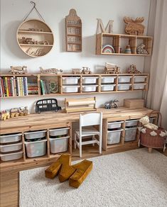 a child's playroom with toys and bookshelves