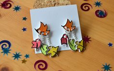 These adorable stud earrings are inspired by Alice Osemans drawings featured in the book series and now Netflix show Heartstopper. The colours on these earrings are very vibrant and feature a silver earring post and butterfly back. Heartstopper Earrings, Birthday Planning, Owl House, Cute Earrings, Jewelry Earrings Studs, Post Earrings, Silver Earrings, Handmade Items, Arts And Crafts