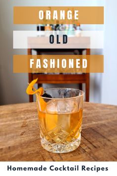 an orange old fashioned cocktail on a wooden table with text overlay that reads homemade cocktail recipes