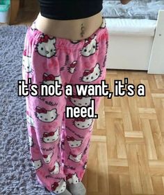 a woman wearing hello kitty pajama pants with the words it's not a want