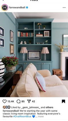 a living room filled with furniture and a fire place in the middle of it's built - in bookshelf