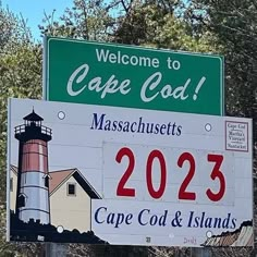 a welcome sign to cape god with a lighthouse on it