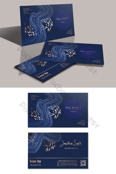 an elegant blue and gold wedding card with floral designs on the front, back and side