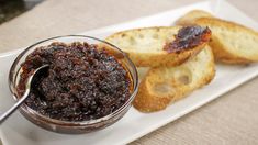 a plate with bread and jam on it