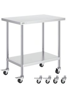 a stainless steel table with four casteors on each side and three wheels attached to it