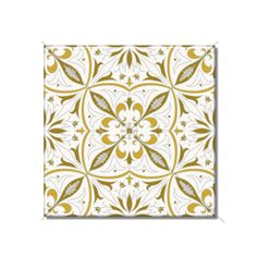 a white and gold tile with an intricate design