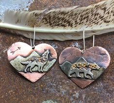 Walking Bear,Howling Wolf earrings by Weathered Soul, large rustic copper and sterling, wildlife lover, nature inspired . Long style sterling ear wires. Bear And Wolf, Wolf Earrings, Gothic Mode, Retro Heart, Vintage Bohemian Style, Howling Wolf, Holiday Party Gift, Heart Dangle Earrings, Cool Gifts For Women