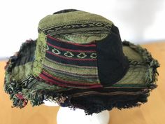 Dear Buyer please note  every hat is unique and every one will be different combination so if want to know what you will be getting  please email us before you buy so we can send some picture to choice from. Unisex Hemp Cotton Wire Rim Festival Patchwork  Hippie Hat Hand Made Nepal.  Condition:  New with tags.  Natural Hemp/cotton Sun Hat with Adjustable Wire Brim Woven hemp and cotton Lined Perfect for summer! Sizing: Maximum head circumference 56 cm - 59 cm (small amount of stretch). UK adult Green Short Brim Hat For Festivals, Green Festival Cap, Green Curved Brim Hat For Festivals, Green Flat Brim Festival Hat, Green Bucket Hat For Festival, Bohemian Green Bucket Hat For Festivals, One Size Brimmed Bucket Hat For Festivals, Green Festival Bucket Hat With Curved Brim, Green Curved Brim Bucket Hat For Festival