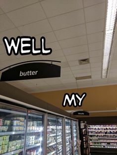 an empty grocery store with the words well and butter on it's display shelves