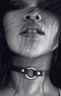 For those looking to test the water of kink, this sleek leather choker featuring a goldtone O-ring is the perfect first step. Style simply with a tee and jeans, or allow the choker to peek out from beneath a crisp white blouse for just the right amount of naughty. Single pin buckle closure Sustainably sourced bridle leather Solid brass or nickel hardware Handmade in Toronto (with ♥) Choker And Leash, Modern Leather Choker Jewelry, Adjustable Leather Trendy Choker, Edgy Leather Choker Jewelry, Edgy Leather Choker, Edgy Adjustable Black Choker, Adjustable Edgy Leather Choker, O Ring Choker, Black Leather Choker