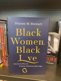 the book black women, black love by dianna m stewart is sitting on a bookshelf