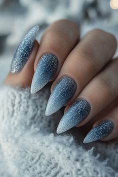 White Blue Sparkle Nails, Light Blue Glitter Almond Nails, Cute Nails For Winter Simple Casual, Blue Glitter Gradient Nails, Simple Almond Nails January, Smokey Ombre Nails, Frosty Nails Blue, Winter Nails Cat Eye Blue, Snow Sparkle Nails