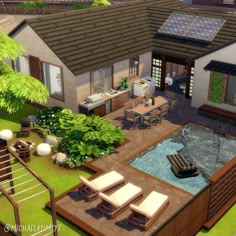 an aerial view of a house with a hot tub in the yard and patio furniture