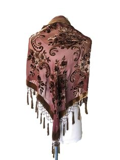 Become entranced with the whirling design of this fringed triangle shawl. Hand-sewn details with glass beads add to the luxurious look, while a silk blend provides a soft and sleek appeal to the pretty piece. 62'' x 28'' with 4'' fringe Viscose / Silk Hand wash; dry flat Luxury Velvet Traditional Shawl, Luxury Vintage Silk Shawl, Mode Country, Velvet Shawl, Triangle Shawl, Spring Roll, Triangle Shawls, Silk Brocade, Lovely Clothes