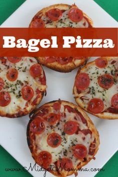 four mini pizzas on a white plate with the words bagel pizza