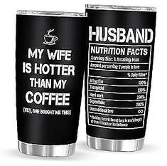 two coffee cups with the words husband and wife written on each cup, one is black