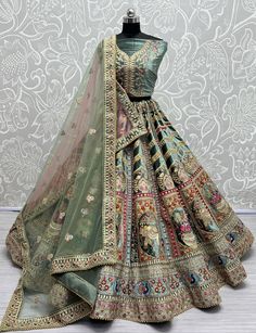 About Product :  Stand out in the crowd adorning this Pista Green colored bridal heavy border lehenga in velvet crafted with intricate Diamond , Multi Thread And embroidery all over enhanced by stone work embellishments. Paired with a similarly embroidered matching colored velvet choli and a net embellished dupatta with embroidered borders .  Lehenga Choli Fabric:  Lehenga Fabric:- Velvet  Blouse Fabric:-  Velvet  Dupatta Fabric:- Soft Net And Soft Net  Work :- Sequence, Embroidery, Diamond And Lace  Size : Free Size Up to 42 Occasion:  Sangeet, Festive, Wedding Washing Instruction: Dry Wash Customize stitching: Please provide your complete size. We will stitch your outfit according to your size.  We will send you measurement chart after order confirmation for custom order. Disclaimer: Act Bridal Wedding Lehenga, Beautiful Gown Designs, Girls Lehenga, Fancy Lehenga, Wedding Lehenga Choli, Velvet Bridesmaid