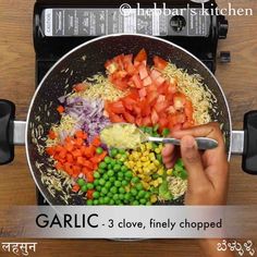 someone using a spoon to stir vegetables in a pan on top of a stove with the words garlic 3 clove, finely chopped